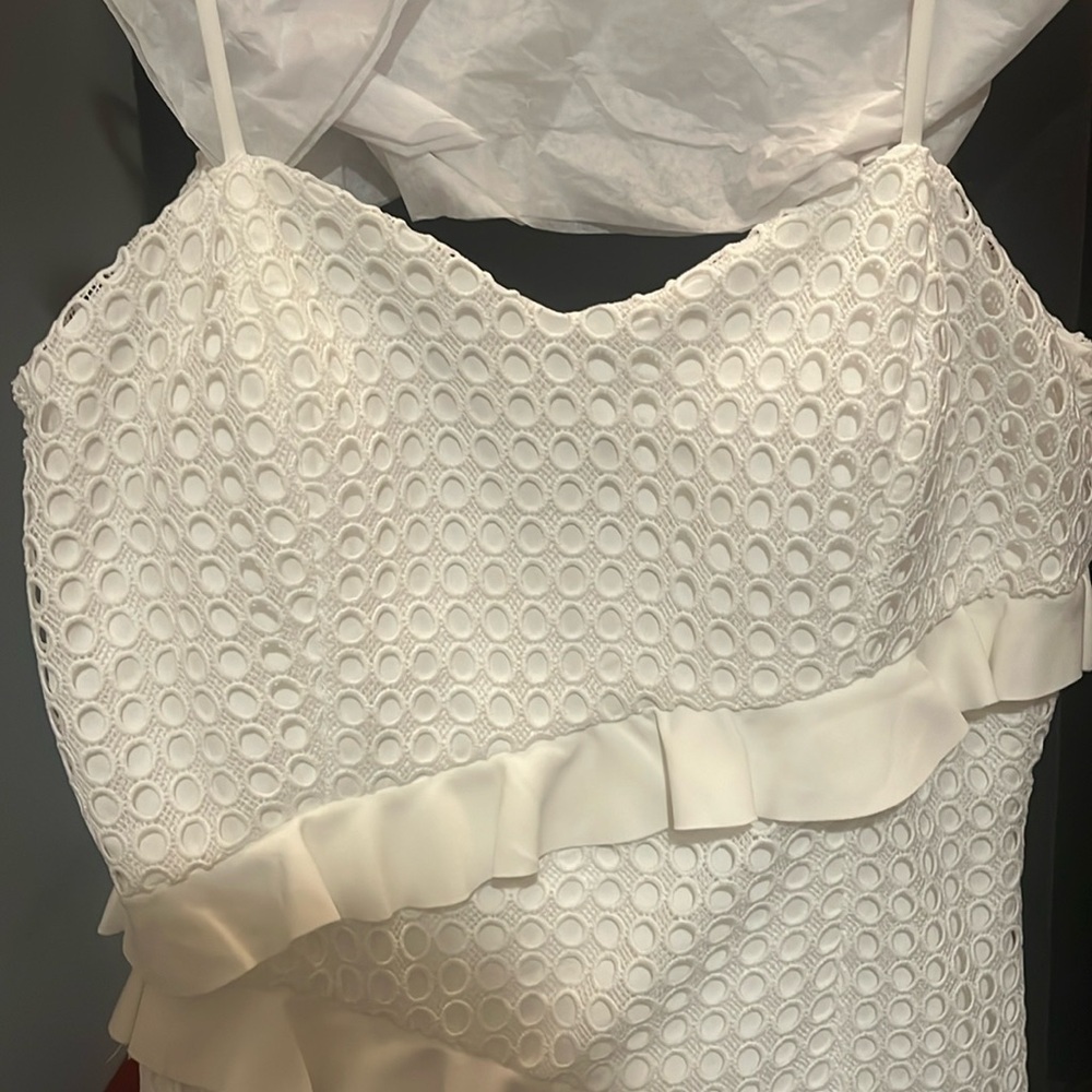 Never worn - perfect for bridal shower- added cups in for support from tailor -